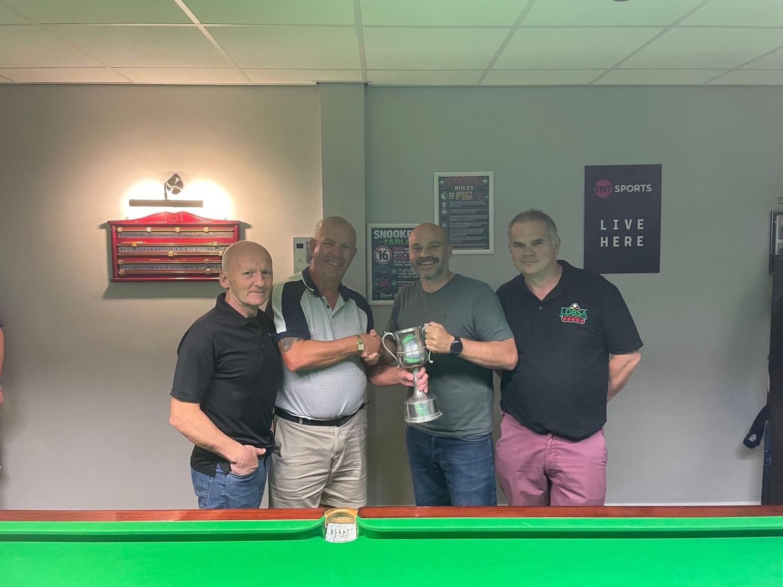 Very Amatuer celebrate with the 2026 LDBSA Summer League trophy
